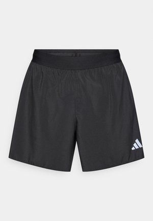 Mustad spordipüksid elastse vöökohaga, valmistatud siledast kangast. Alumises paremas nurgas on valge Adidas logo.