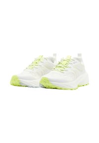 White athletic shoes with light green accents, mesh upper, textured midsole, and rugged rubber outsole. Laces and pull tab included.