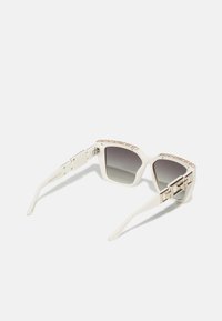Guess Lunettes de soleil white/blanc ZALANDO