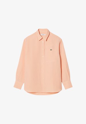 Camicia a maniche lunghe con bottoni, a righe verticali di colore arancione chiaro, con colletto e taschino sul petto con piccolo logo di coccodrillo verde ricamato.