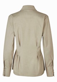 Beige langermet skjorte med krage, plisserte bakstykket og knappede mansjetter. Laget av et glatt, strukturert stoff.