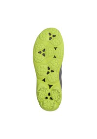 Groene rubberen buitenzool met gepatineerde grippatronen, met een grijze bovenkant. Rond vormgegeven met meerdere gripnoppen voor stabiliteit.