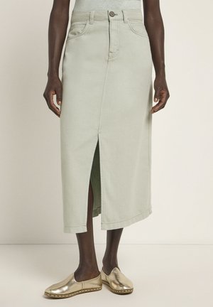 Light green denim skirt with a front slit, mid-length, featuring traditional five-pocket design and a subtle textured finish.