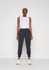 Sweaty Betty GAIA YOGA PANTS - Παντελόνι φόρμας - black