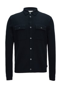 Donker marineblauwe cardigan met een knoopsluiting aan de voorkant, twee borstzakken, lange mouwen en een gestructureerde brei stof. Beschikt over zilveren knopen.