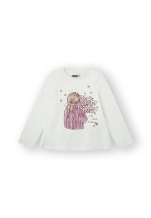 Camiseta blanca de manga larga con una ilustración de una niña de cabello trenzado sosteniendo flores, con acentos en rosa y morado y el texto "De Petits Bonheurs".