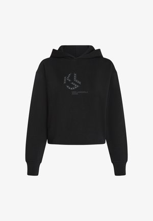 Čierny skrátený hoodie vyrobený z mäkkej tkaniny, so predným grafickým logom so striebornými nitmi, dlhými rukávmi a kapucňou so sťahovacou šnúrkou.