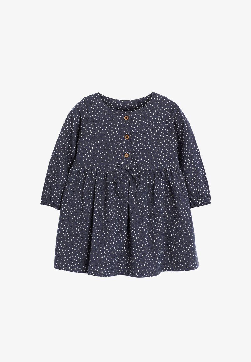 Robe marine à manches longues, col rond et jupe froncée. Présente des motifs triangulaires blancs, des boutons en bois et une ceinture à la taille.