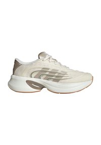 Light beige running shoe with textured upper, reflective accents, plush tongue, cushioned sole, and rubber outsole for grip.