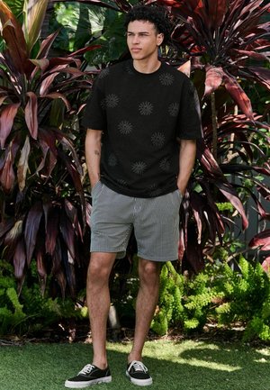REGULAR FIT - PLACEMENT FLORAL  - Print T-shirt - black