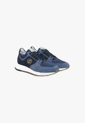 Navyblaue Sneakers aus Wildleder und Mesh, mit einer runden Zehe, weißer Sohle und einem goldenen Logo-Detail an der Seite.
