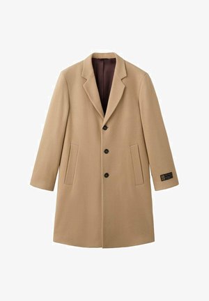 Beiger Wollmischmantel mit gekerbtem Revers, drei schwarzen Knöpfen, zwei Fronttaschen und braunem Innenfutter. Markenetikett am Ärmel.