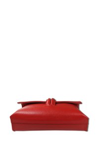 Red leather clutch with a structured shape, smooth texture, and a distinctive knotted detail at the top. Features stitching along the edges.