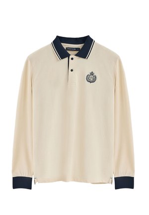 Polo a maniche lunghe in cotone crema con colletto navy, tre bottoni e logo ricamato con design a corona e alloro.