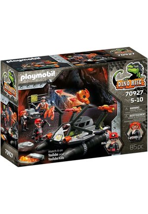 Playmobil Dino Rise set box features a gray vehicle with orange accents, figures in red helmets, and cave background, showcasing an action scene.