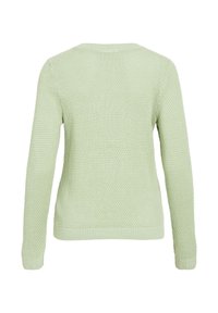 Πλεκτό πουλόβερ σε ανοιχτό πράσινο χρώμα με υφή, μακριά μανίκια και στρογγυλή λαιμόκοψη, με ριμπ τελείωμα στο κάτω μέρος και στα μανίκια.