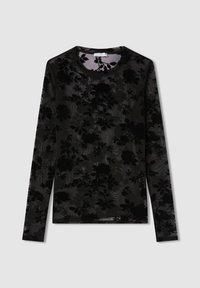 Maglietta nera a maniche lunghe con un motivo floreale in velluto, tessuto semi-trasparente, scollatura a giro e texture liscia.