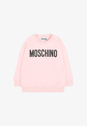 Jasnoróżowa dziecięca bluza z długimi rękawami, czarnym napisem "MOSCHINO" na piersi oraz zatrzaskami na jednym ramieniu.