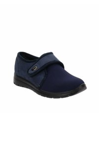 Granatowe buty wsuwane z rzepem. Wykonane z miękkiego materiału tekstylnego i gumowej podeszwy, charakteryzujące się gładką fakturą oraz zaokrąglonym noskiem.