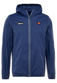 Navy blue lightweight windbreaker jacket with a hood, featuring a front zipper, two side pockets, and logo patches on the chest.