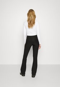 Tommy Jeans PARTY  - Calças - black