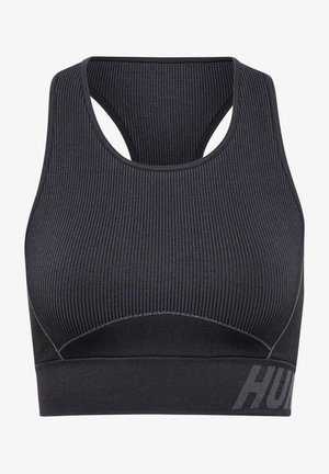 Black ribbed sports bra with a racerback design, featuring a contrasting logo on the band and smooth texture throughout.