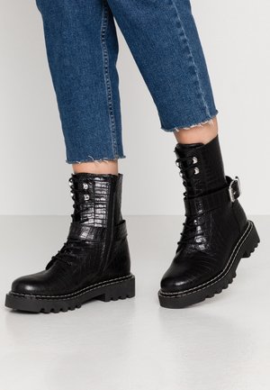 Nauhalliset nilkkurit - black