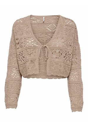Utmärkt stickad tröja i ljusbrun färg med intrikata hålmönster, djup V-ringning och knytbandsstängning framtill. Mjuk textur och långa ärmar.