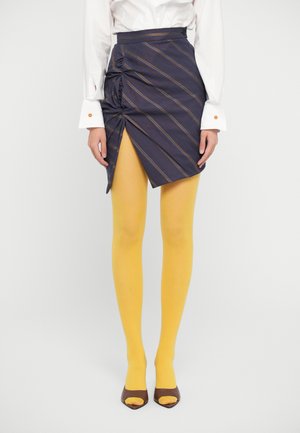 Striped navy skirt with ruching detail, worn with yellow tights and brown open-toe heels. The skirt features an asymmetrical hem and button.