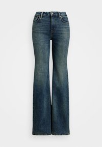 Fadede blå flared jeans laget av denim. Høy midje-design med klassisk 5-lomme stil og synlige sømdetaljer.