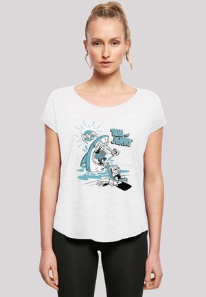 White short-sleeve t-shirt featuring a cartoon graphic of a shark and character. Soft material with a relaxed fit and round neckline.