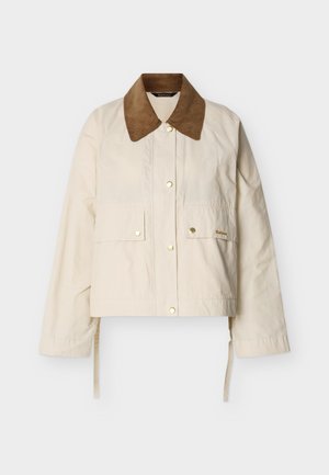 Roomkleurig jack met een bruine corduroy kraag, drukknopen aan de voorkant, twee klepzakken en verstelbare riempjes aan de zijkant.