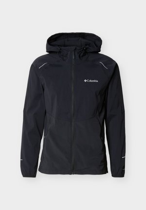Veste à capuche Columbia noire avec fermeture éclair intégrale à l'avant, manches longues, poignets élastiques, deux poches latérales et détails réfléchissants sur les épaules et les manches.