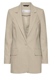 Blazer beige con solapa muesca, cierre de un botón, dos bolsillos frontales y textura suave. Interior forrado con detalles en negro.