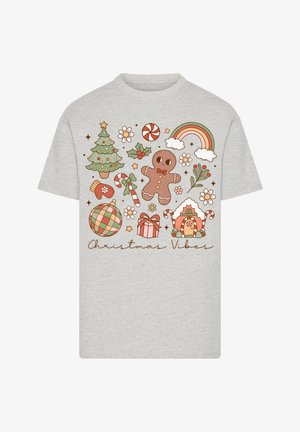 Graues T-Shirt mit kurzen Ärmeln und weihnachtlichen Grafiken: Baum, Lebkuchenmann, Geschenke, Zuckerstangen, Regenbogen und Blumen mit dem Schriftzug "Christmas Vibes".