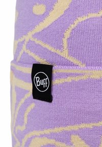 Lavender knit beanie featuring a cream abstract pattern. Includes a black "Buff" label. Soft texture, form-fitting design.