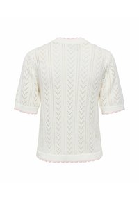 Pull blanc à manches courtes en maille avec motif chevron ajouré et bordure festonnée rose clair aux poignets, à l'encolure et à l'ourlet.