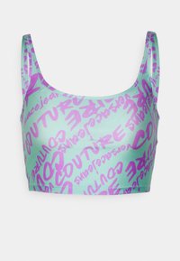 Myntgrön crop top med lila abstrakt textmönster, med rundad halsringning och justerbara band gjorda av ett slätt, elastiskt material.