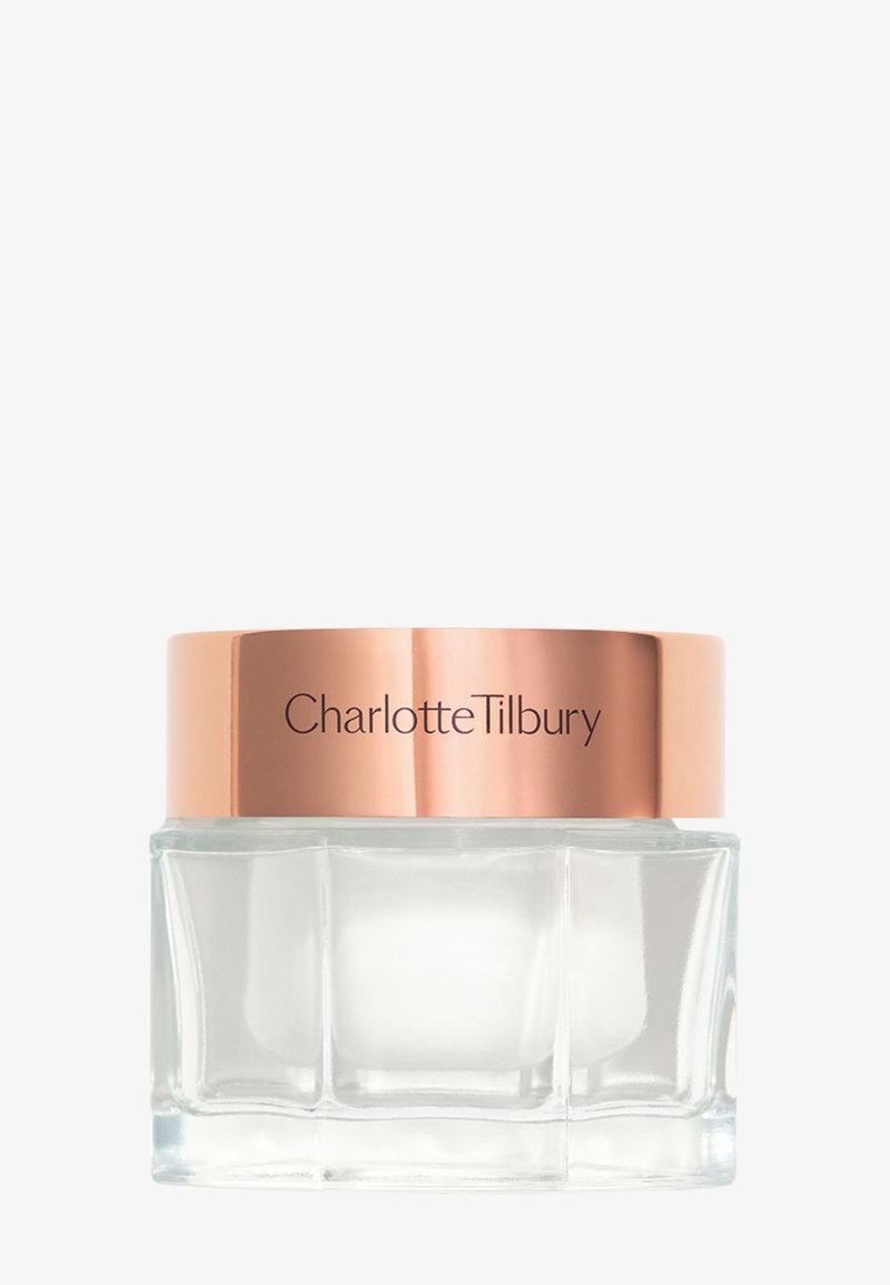 Clear glass jar with a rectangular shape, featuring a rose gold metallic lid inscribed with "Charlotte Tilbury." Smooth surface, minimalist design.