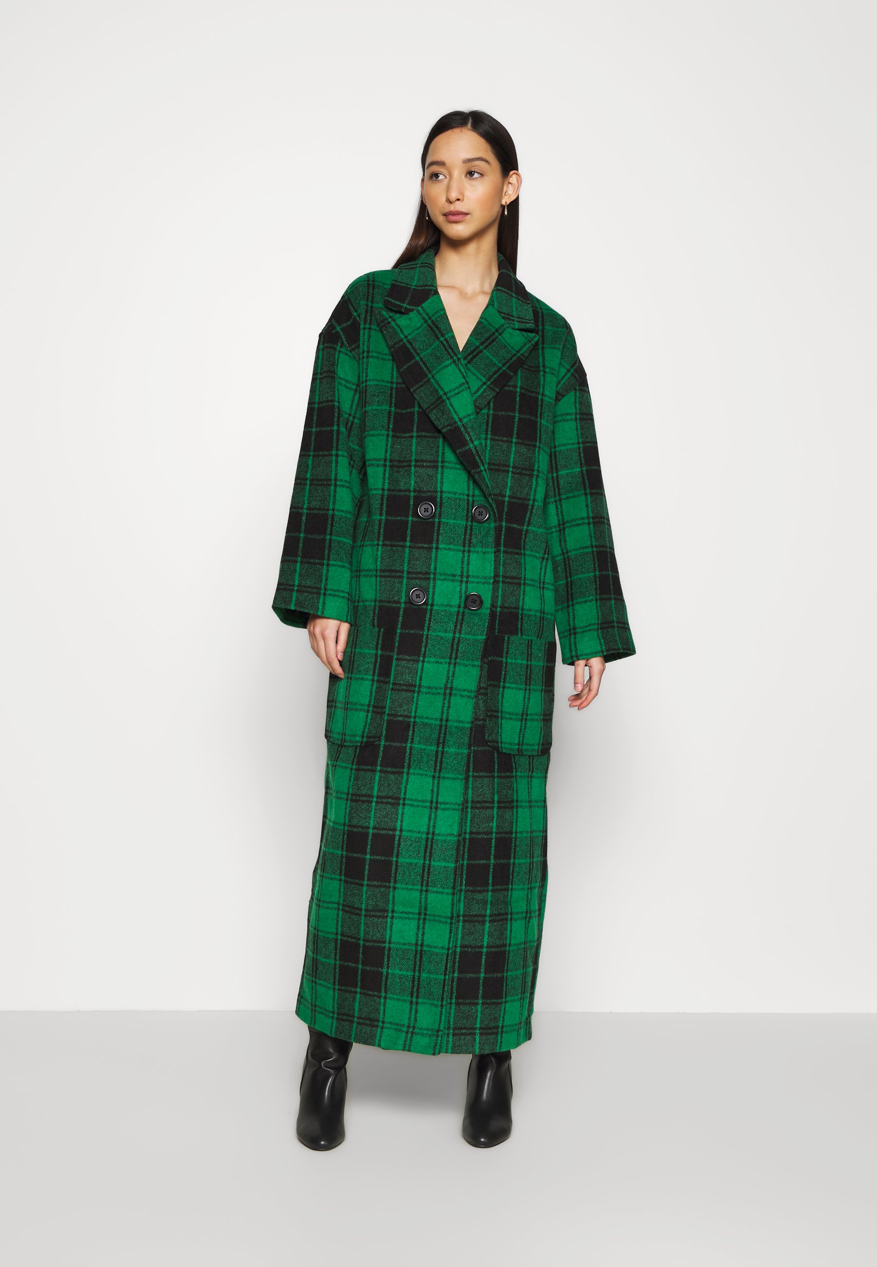 green oversized coat