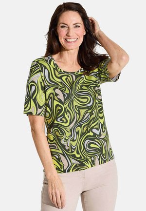 Korte mouwen blouse met een draaiend patroon in groen, beige en zwart. Gemaakt van gladde stof met een ronde hals en een ontspannen pasvorm.
