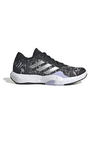Schwarzer Sportschuh mit einem gemusterten Stoffoberteil, silbernen Akzenten, einer weißen Zwischensohle und einer strukturierten Laufsohle für besseren Halt.