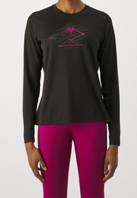 Black long-sleeve athletic shirt featuring a pink logo and mountain graphic, made of lightweight material; worn with pink leggings.