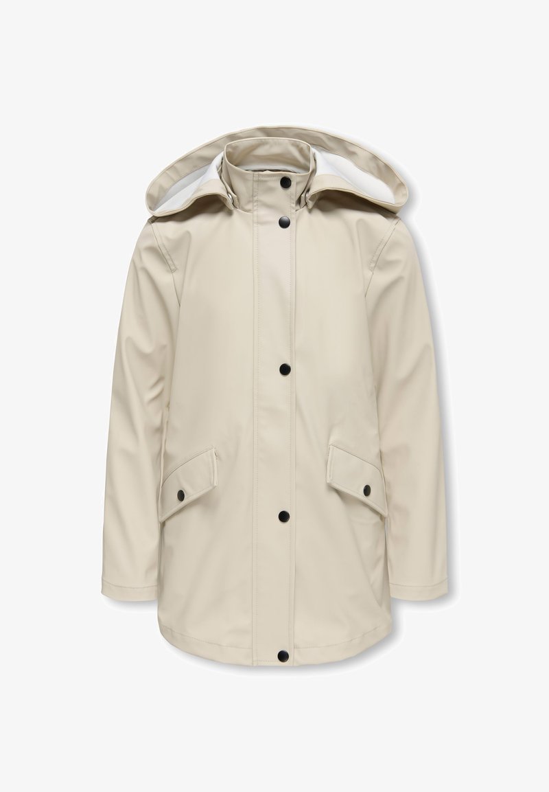 Μπεζ αδιάβροχο μπουφάν με κουκούλα, με μαύρα κουμπώματα με πατήματα και δύο μπροστινές τσέπες. Ομαλή υφή και ίσια γραμμή σχεδίασης.