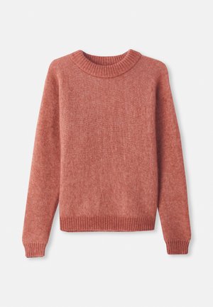 Genser i støvete rosa farge, laget av mykt stoff. Har en ribbet rund hals, ribbete mansjetter og rett avslutning.