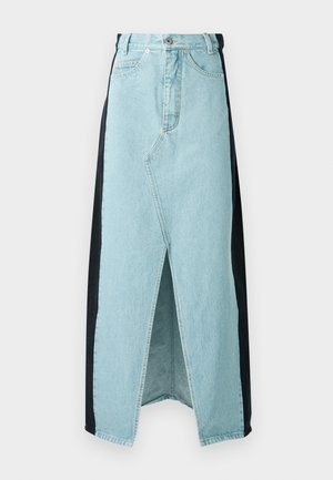 Denim skirt combining light blue and black materials, featuring a front slit, high waist, and structured design with standard button closure.