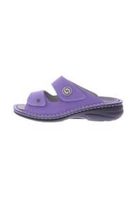 Purple slide sandal with two adjustable Velcro straps, soft inner lining, and a cushioned black sole. Features a circular metal accent.