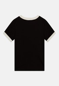 Calvin Klein Jeans Triko s potiskem - black
