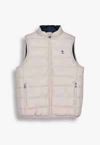 Chaleco sin mangas beige acolchado con cremallera frontal, dos bolsillos con cremallera y pequeño logo navy en el pecho izquierdo, forro interior navy.