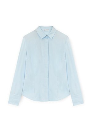 Lichtblauwe langharige shirt met een puntkraag, knoopsluiting aan de voorkant en een effen textuur. Heeft zijnaad en rechte zoom.